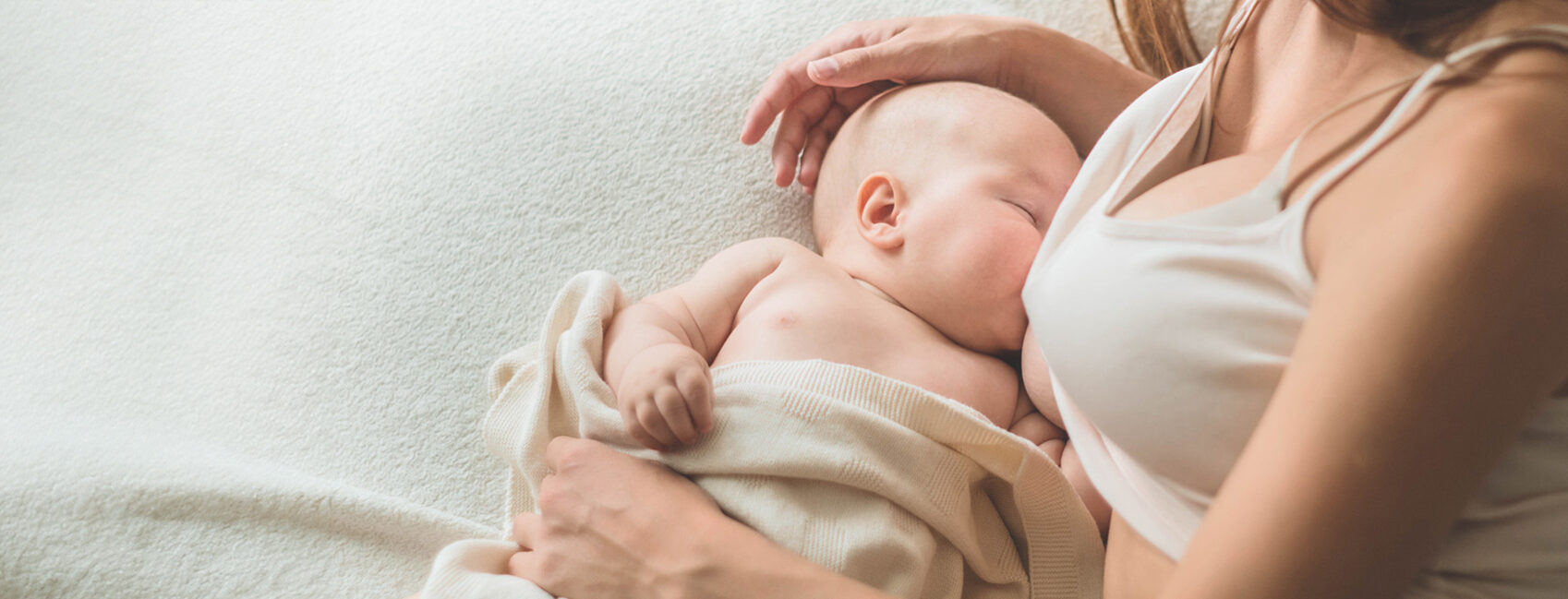 Woman Breastfeeding Her Child